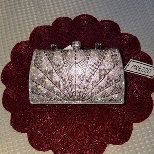 Prezzo Silver Sparkly Clutch Bag with handle and shoulder chain